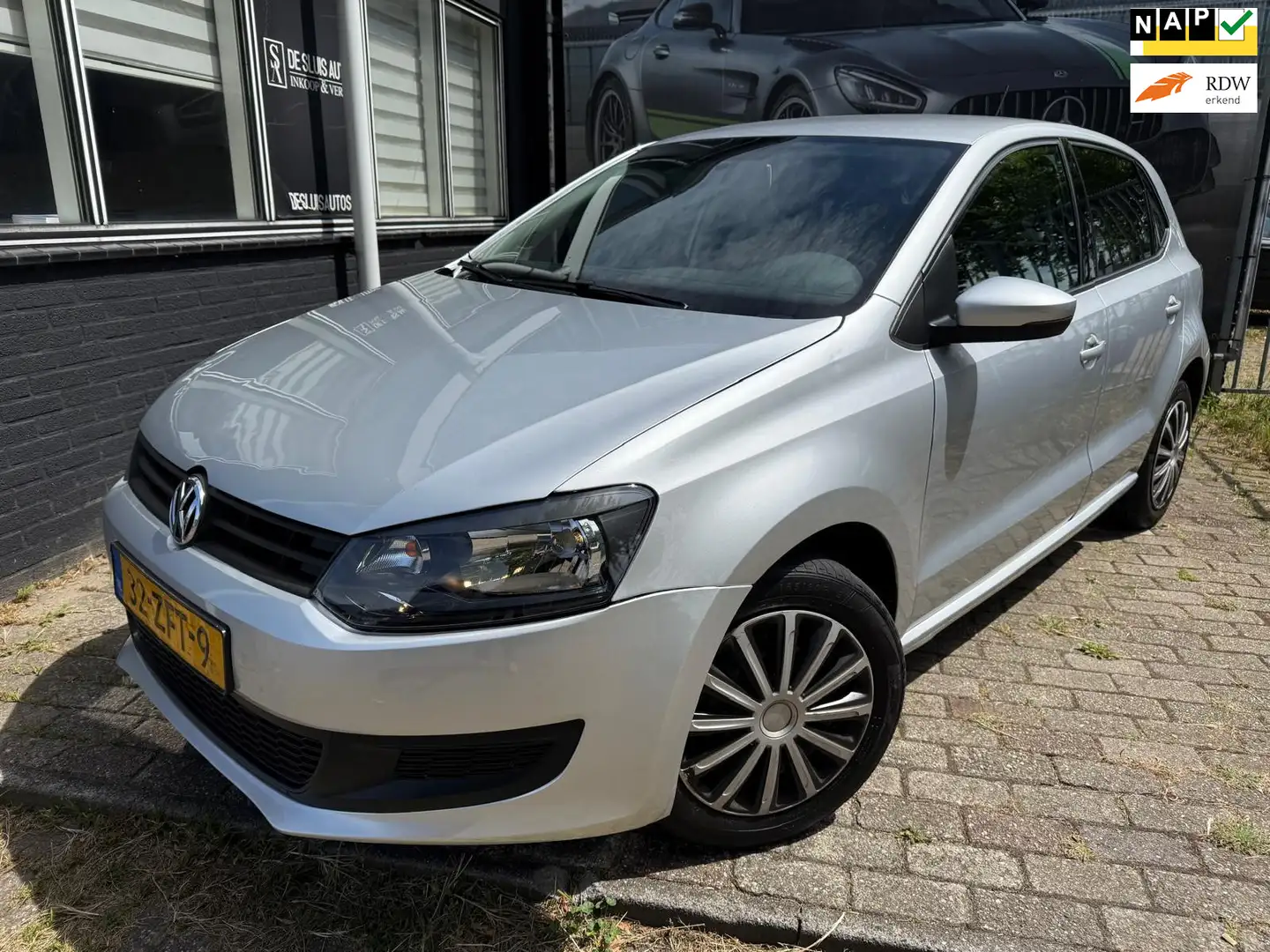 Volkswagen Polo 1.2-12V BlueMotion Comfortline Airco Navi Grijs - 1