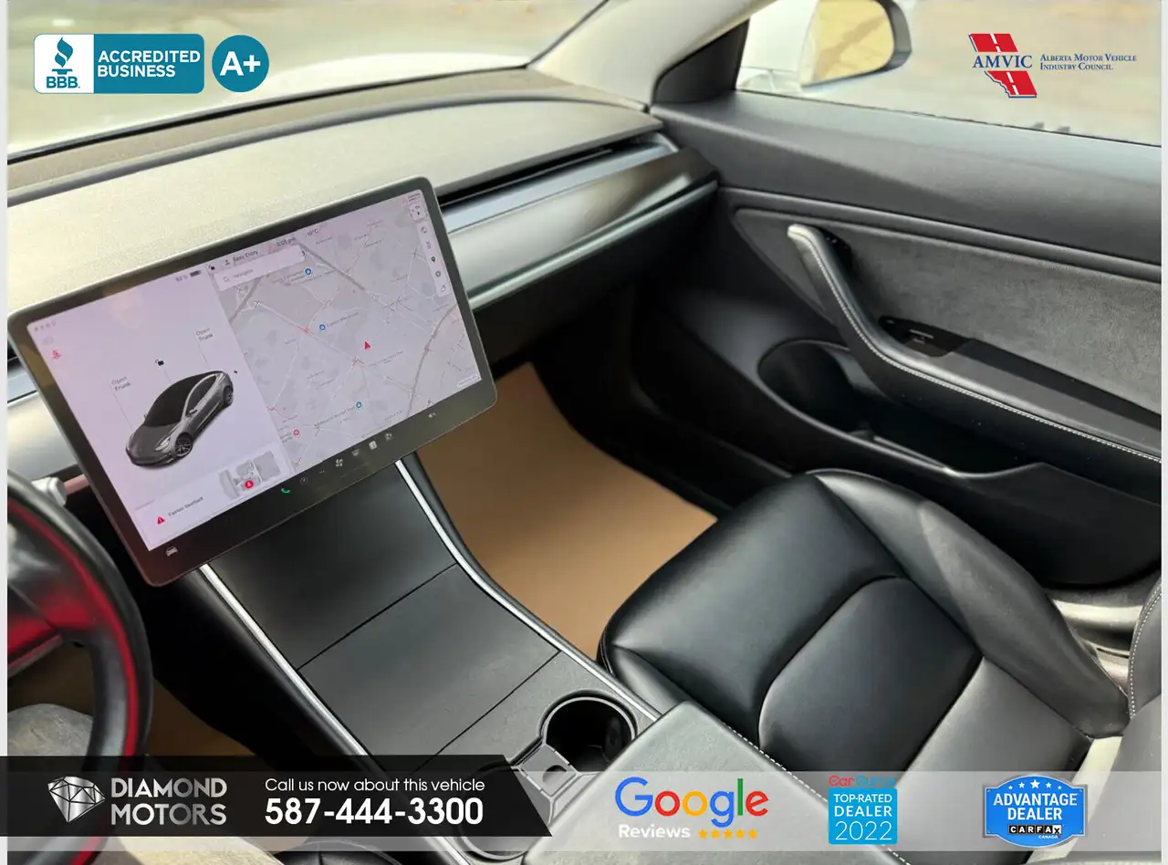 Tesla Model 3 photo Tesla Model 3