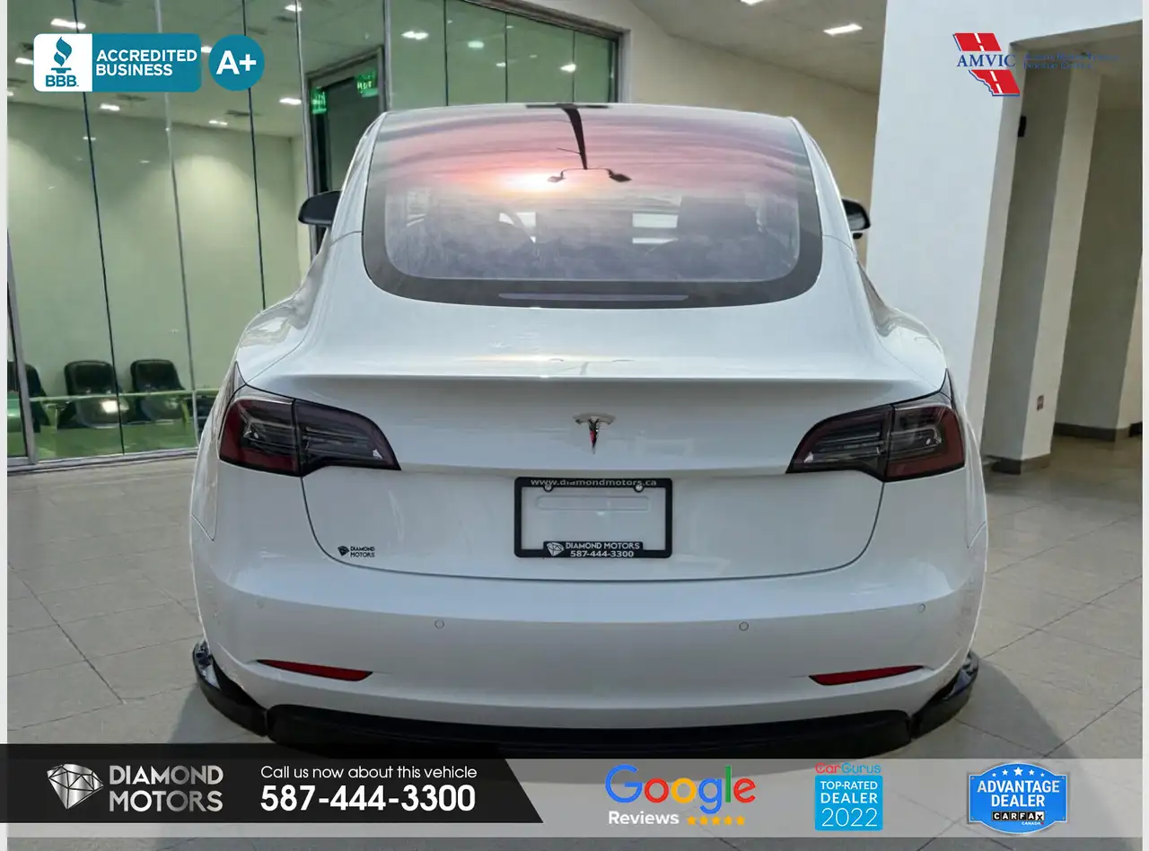 Tesla Model 3 photo Tesla Model 3