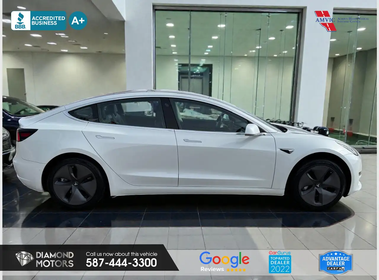 Tesla Model 3 photo Tesla Model 3