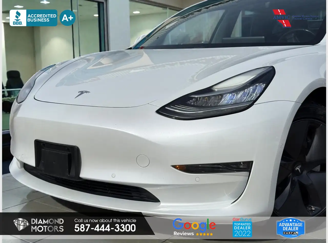 Tesla Model 3 photo Tesla Model 3