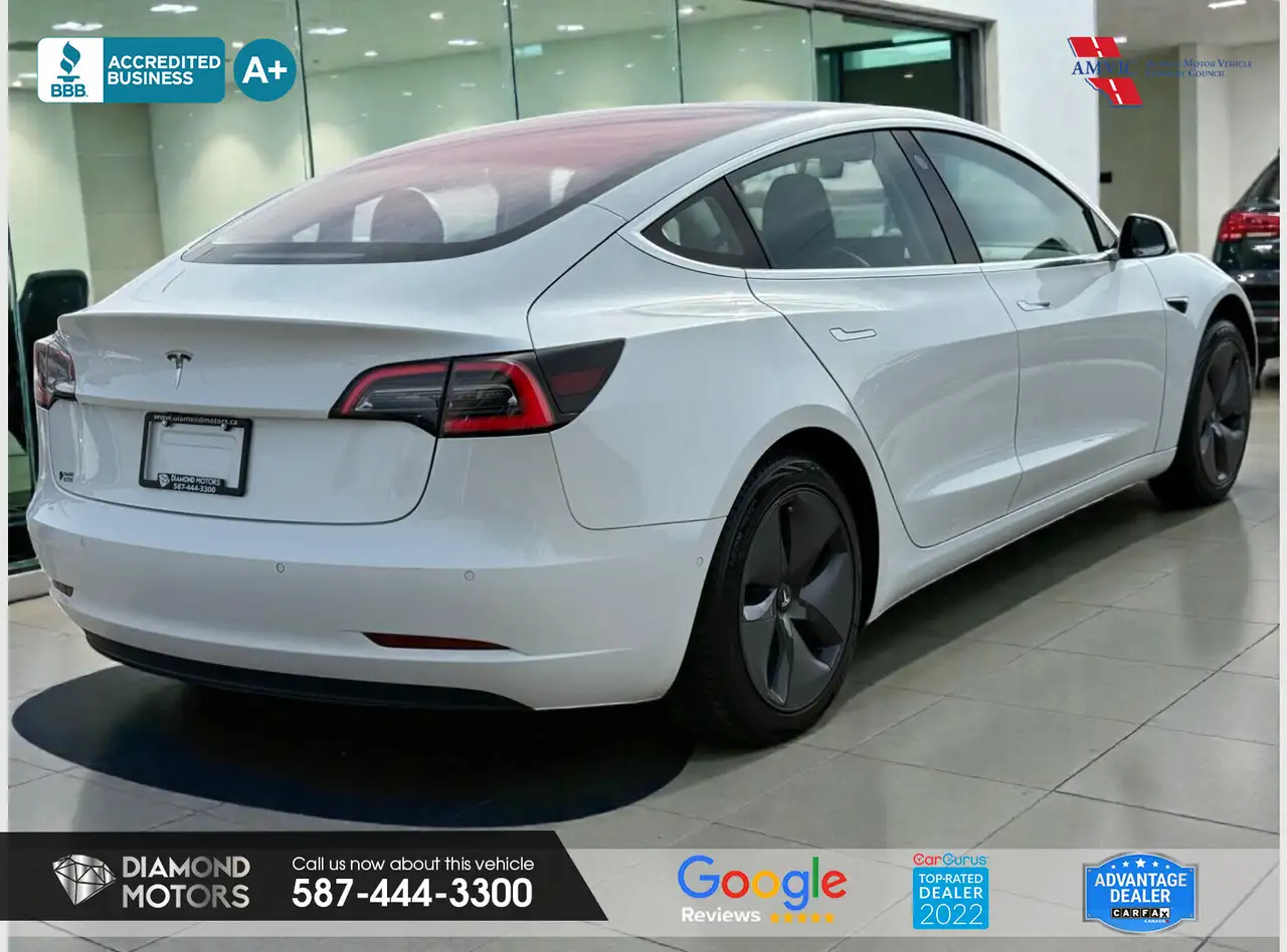 Tesla Model 3 photo Tesla Model 3