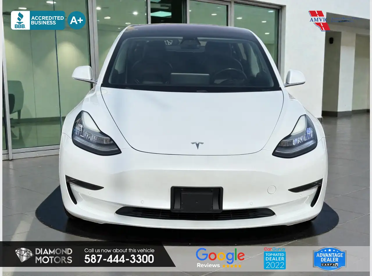 Tesla Model 3 photo Tesla Model 3