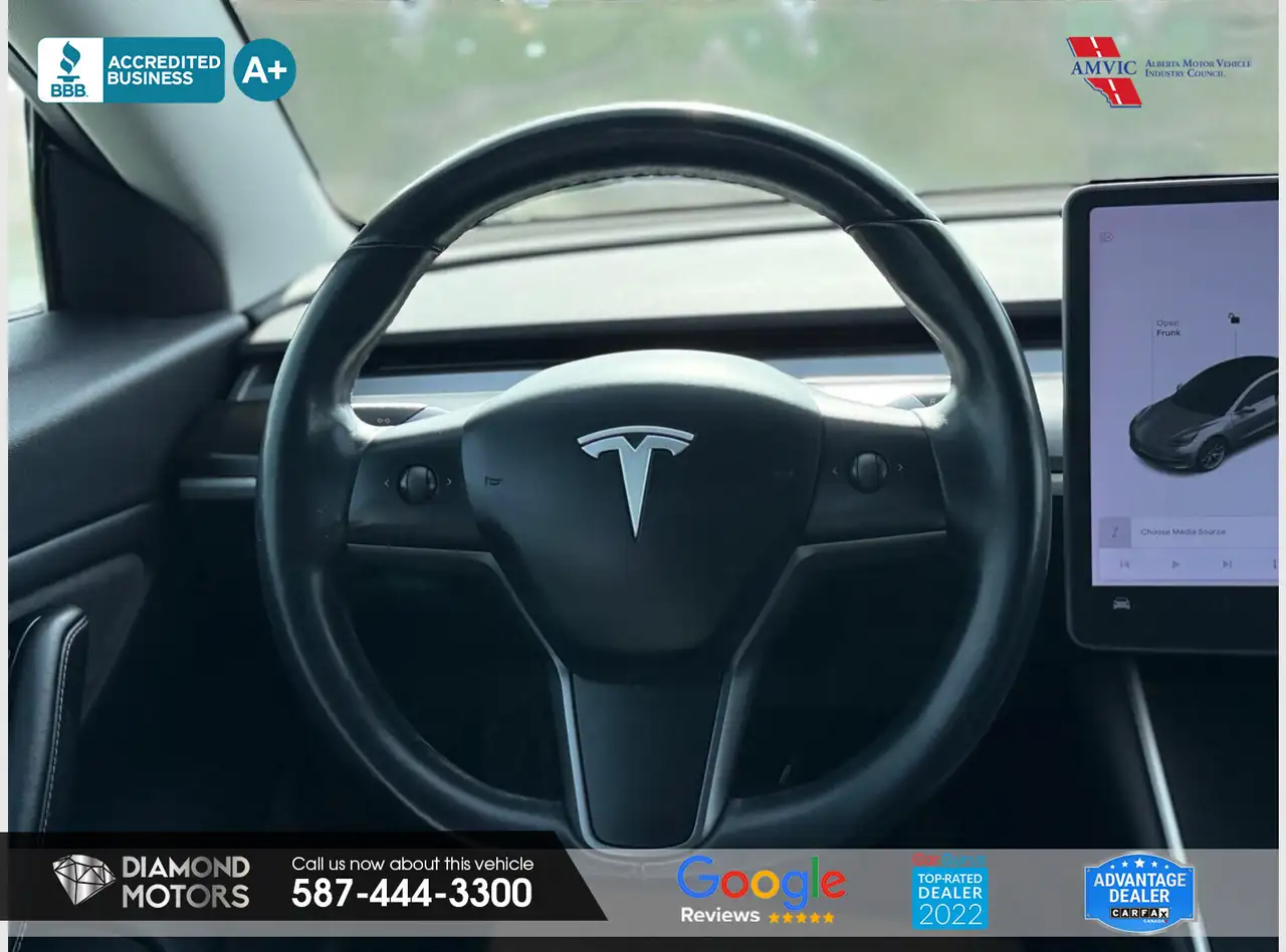 Tesla Model 3 photo Tesla Model 3