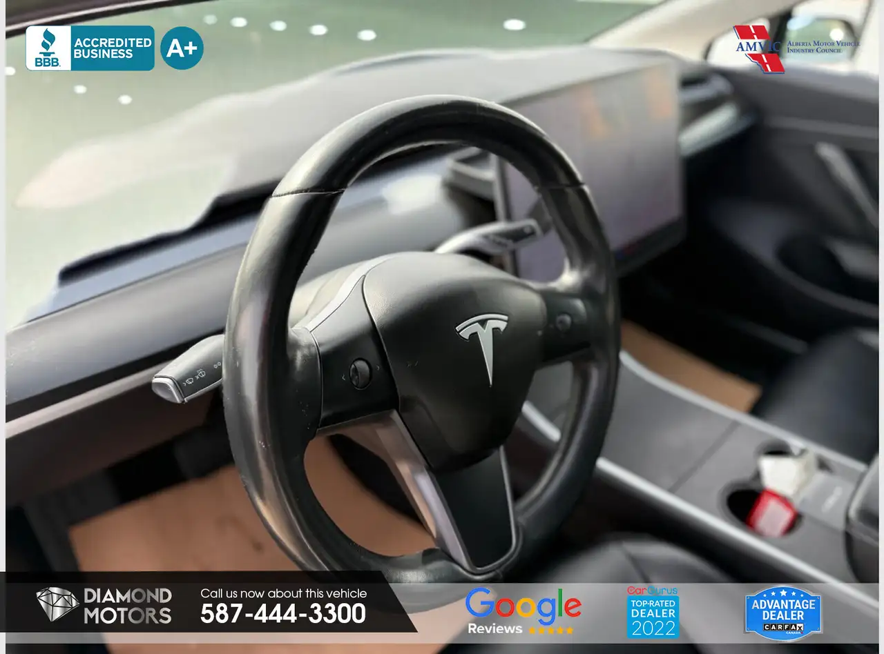 Tesla Model 3 photo Tesla Model 3
