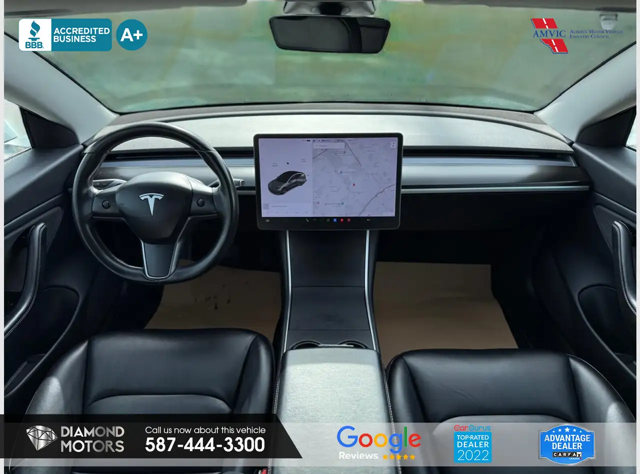 Tesla Model 3 photo Tesla Model 3