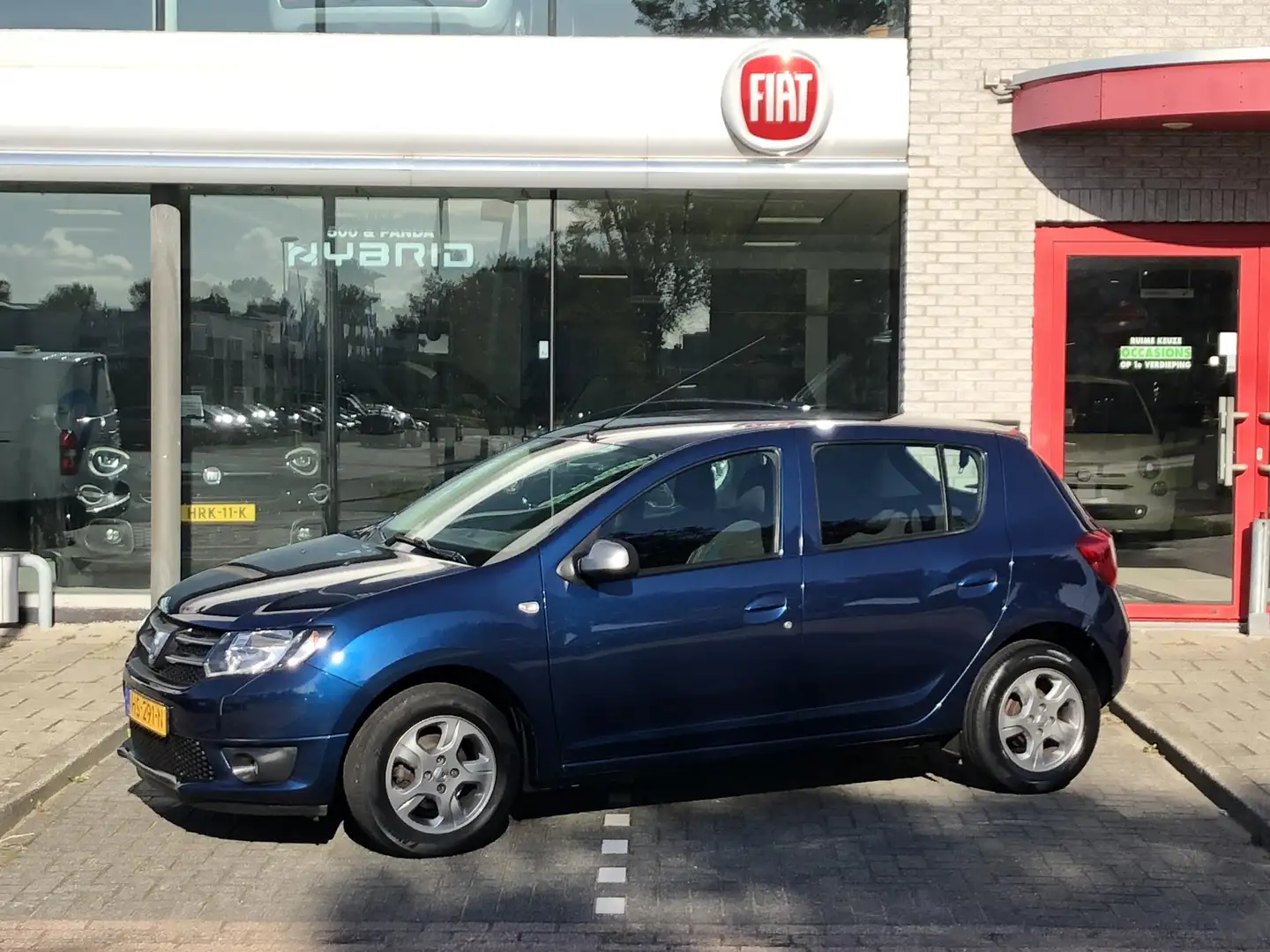 Dacia Sandero TCe 10th Anniversary AIRCO|CRUISE CONTROL|TREKHAAK Blauw - 1