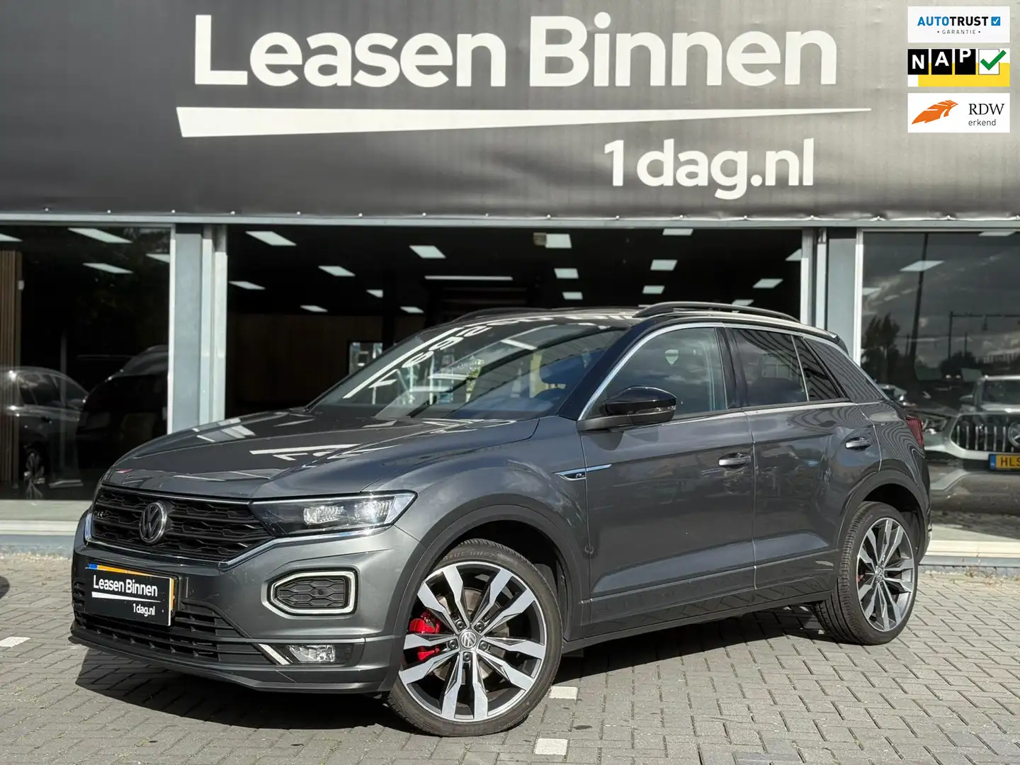 Volkswagen T-Roc 2.0 TSI 4Motion Sport 3x R-Line Pano/Cam/Blindspot Gris - 1