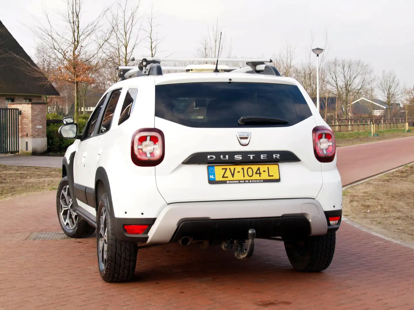 Dacia Duster 1.6 SCe Prestige | Unieke bedrijfswagen | 4X4 | Ca Wit - 2