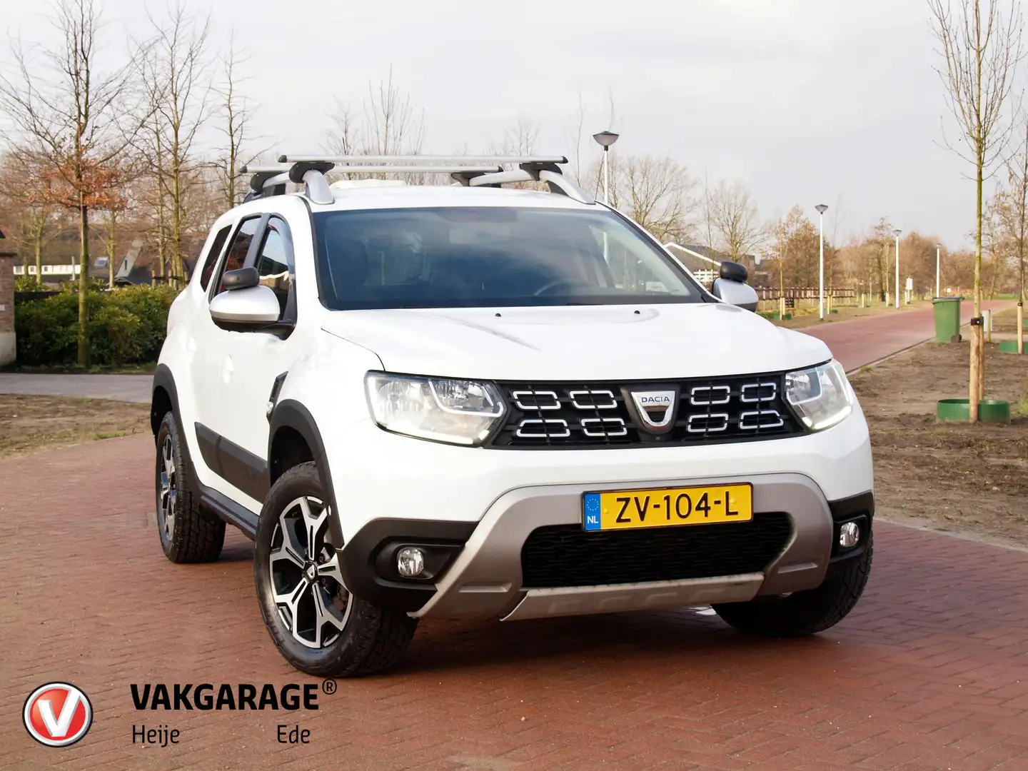 Dacia Duster 1.6 SCe Prestige | Unieke bedrijfswagen | 4X4 | Ca Wit - 1