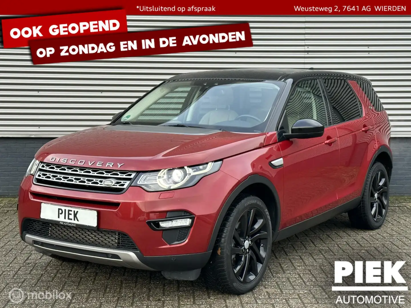 Land Rover Discovery Sport 2.0 Si4 4WD HSE PANORAMADAK Rood - 1