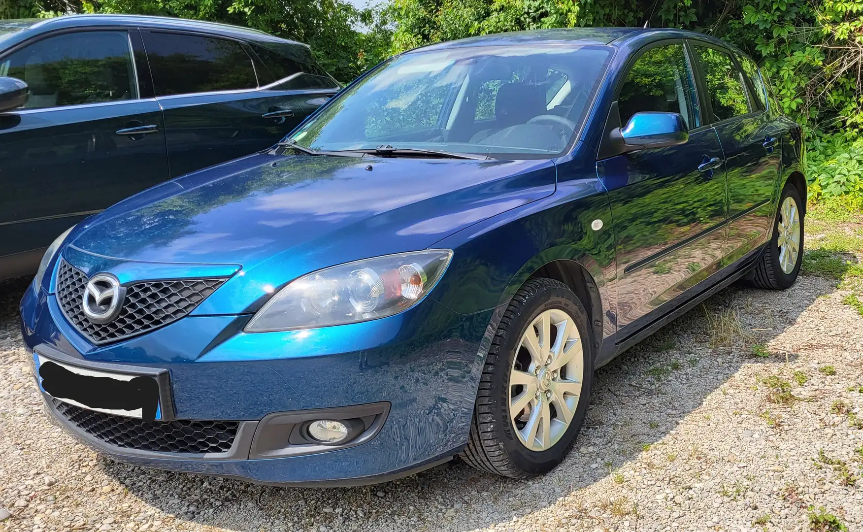 Mazda 3 Vert - 1