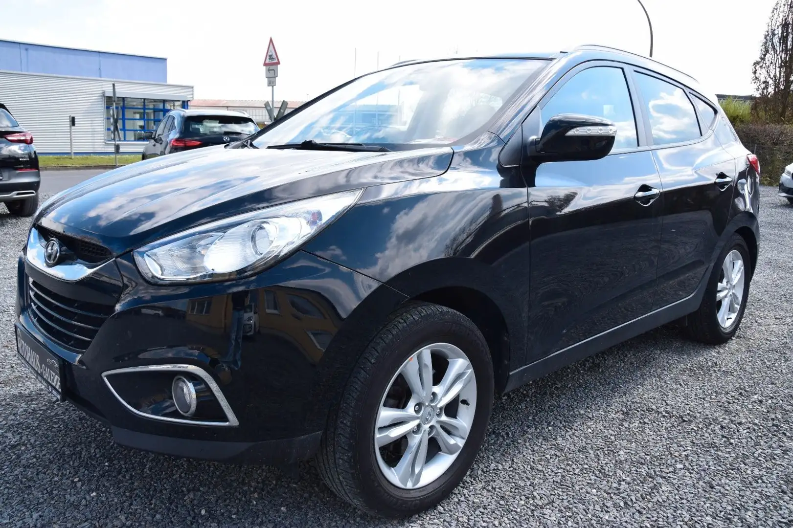 Hyundai TUCSON ix35 2.0 CRDi AWD*NAVI*AHK*KAMERA Noir - 1