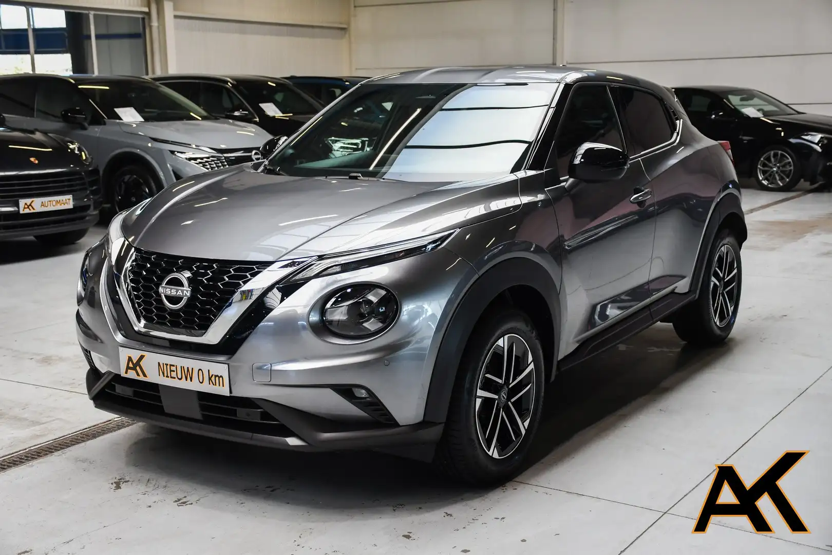 Nissan Juke 1.0 DIG-T N-Connecta DCT NIEUW - NAVI / CAMERA /CC Gris - 1