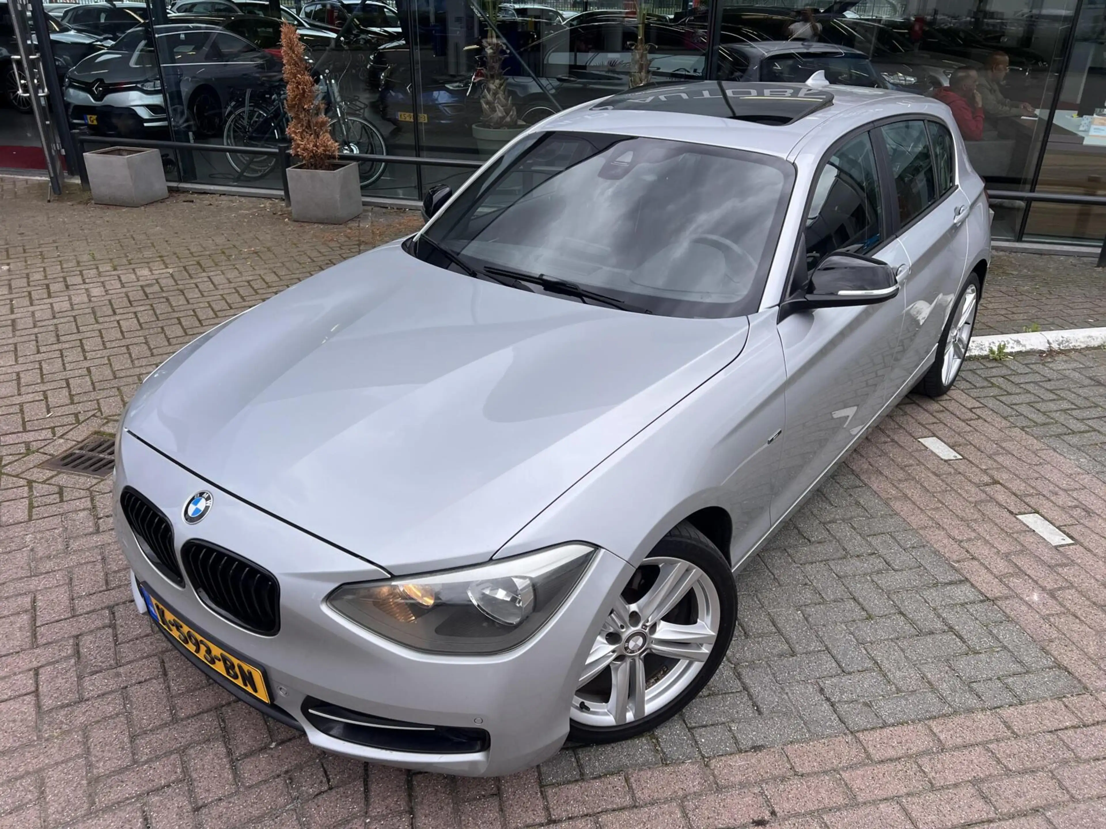 BMW 118 1-serie 118i Sport Line Airco Cruise Navi Open dak — photo 9