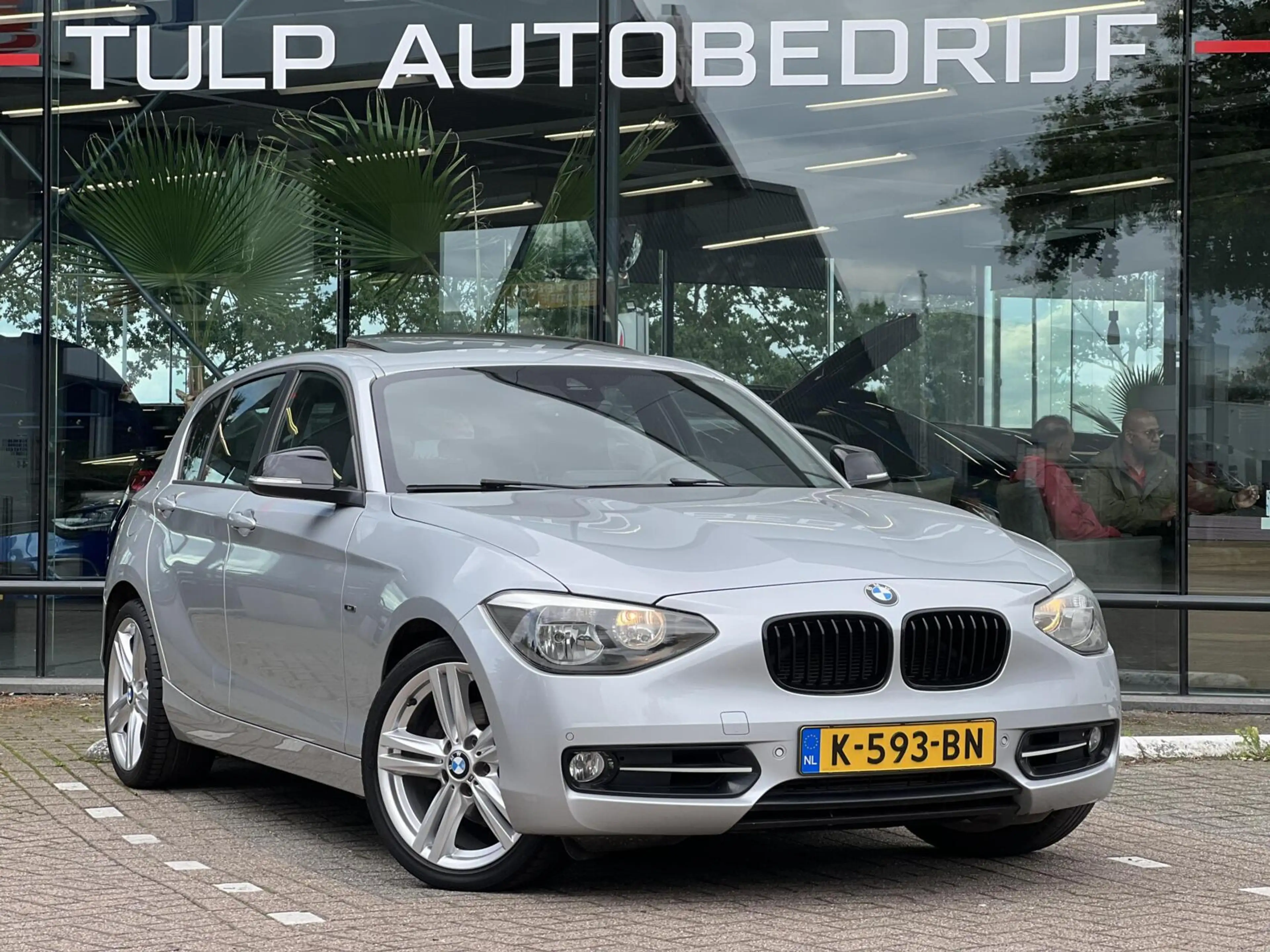 BMW 118 1-serie 118i Sport Line Airco Cruise Navi Open dak — photo 2