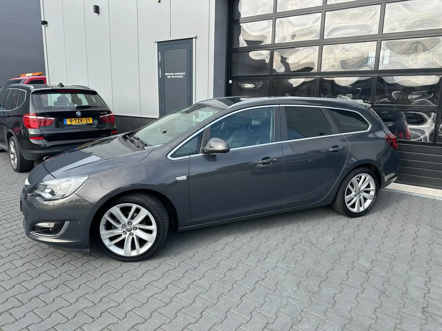 Opel Astra Sports Tourer 1.4 Turbo Sport + LEER Sportstoelen Gris - 2