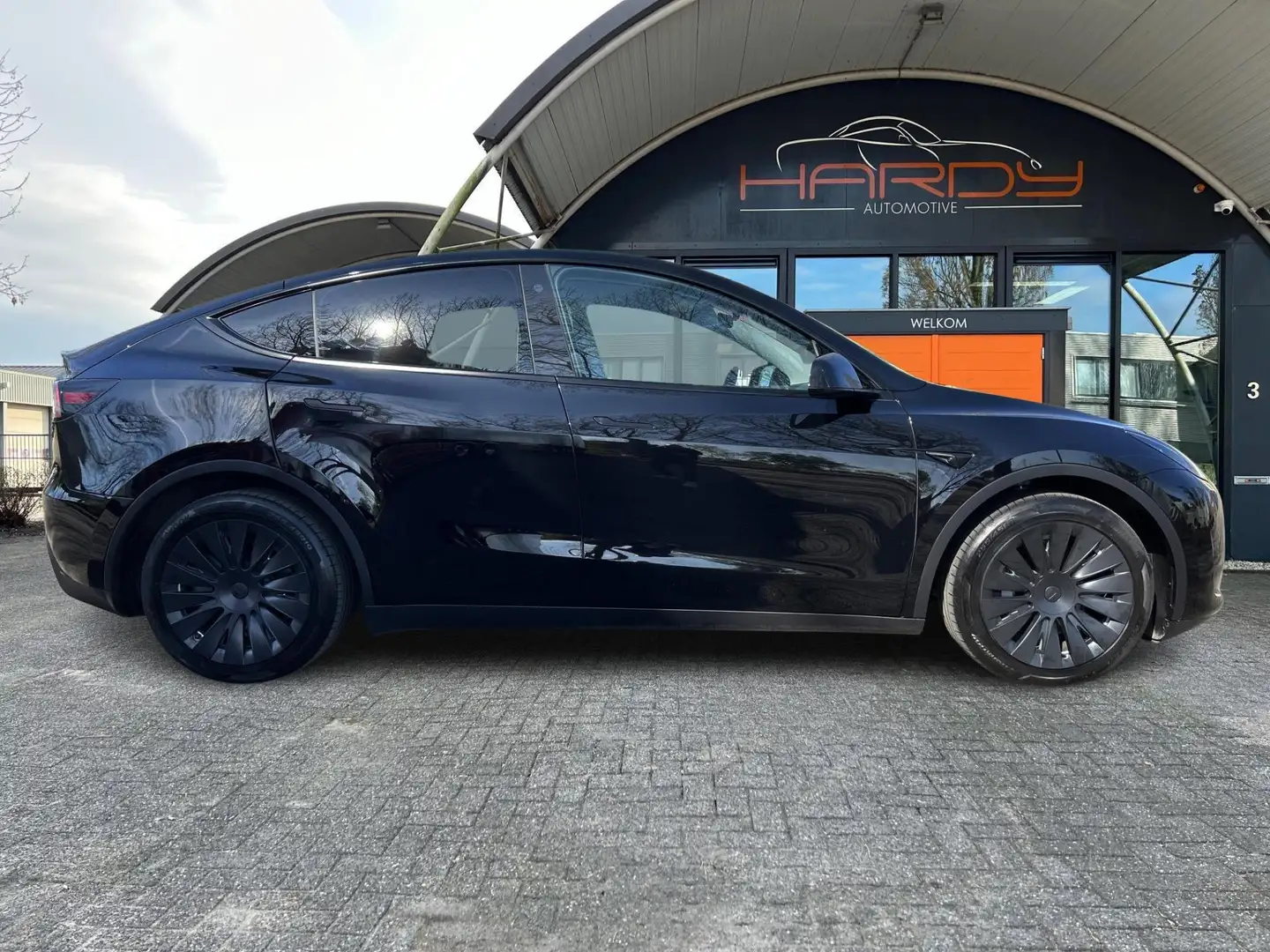 Tesla Model Y RWD 58 kWh 96% SOH Trekhaak Autopilot 1e EIG Rijkl Zwart - 2