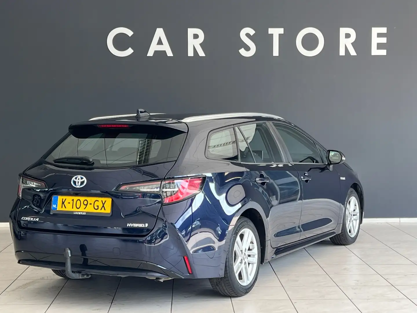 Toyota Corolla Touring Sports 1.8 Hybrid Business TREKHAAK NL AUT Blauw - 2