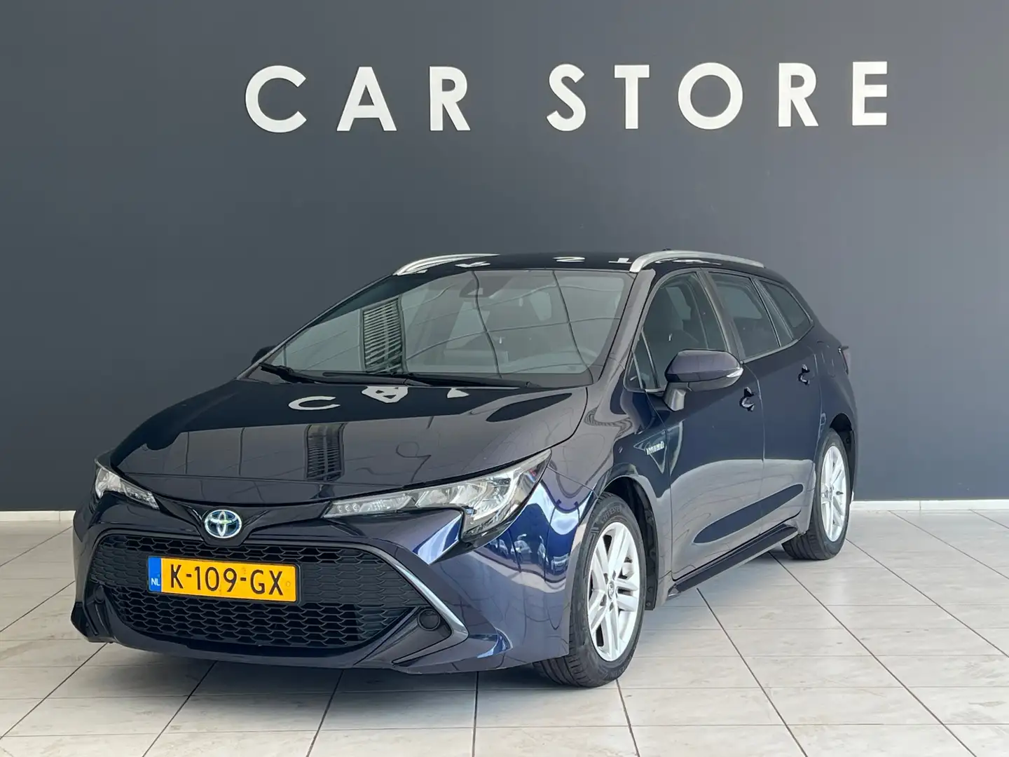 Toyota Corolla Touring Sports 1.8 Hybrid Business TREKHAAK NL AUT Blauw - 1