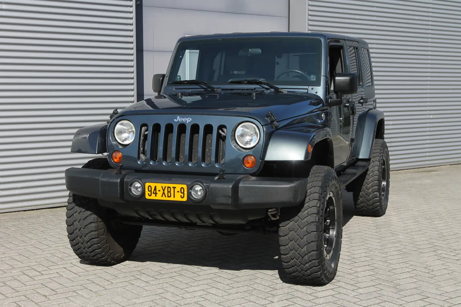 Jeep Wrangler Unlimited 3.8 High Sport I Aut. I Hardtop I 4WD Grijs - 2