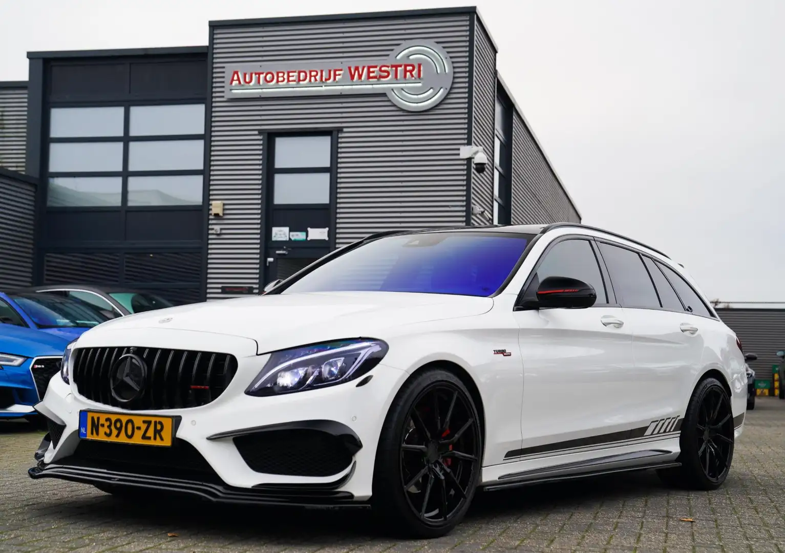 Mercedes-Benz C 180 Estate AMG / 63s AMG LOOK Premium Plus | Burmester Weiß - 1