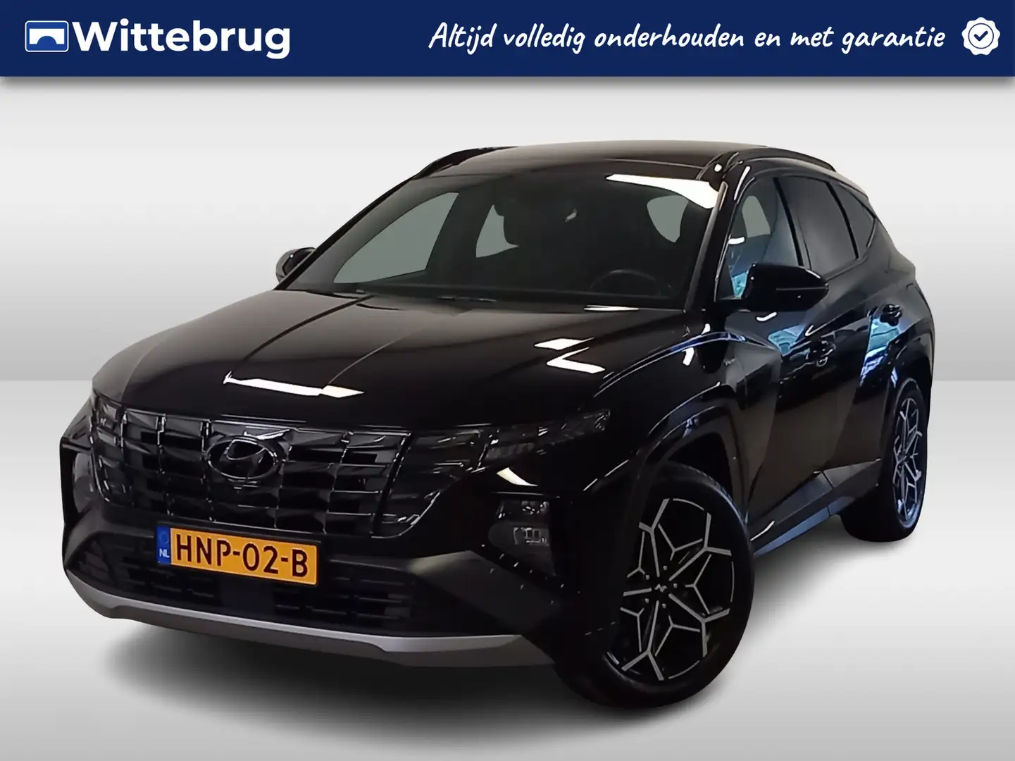 Hyundai TUCSON 1.6 T-GDI PHEV N Line Sky 4WD Sportieve uitvoering Zwart - 1