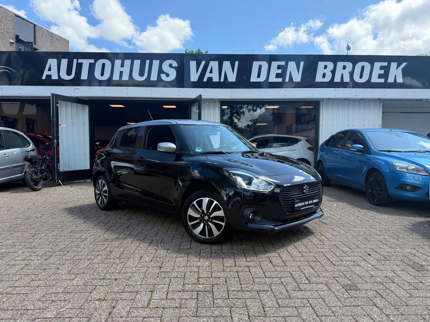Suzuki Swift 1.0 Boosterjet 112Pk Smart Hybrid|DealerOH|Xenon|A Negro - 1
