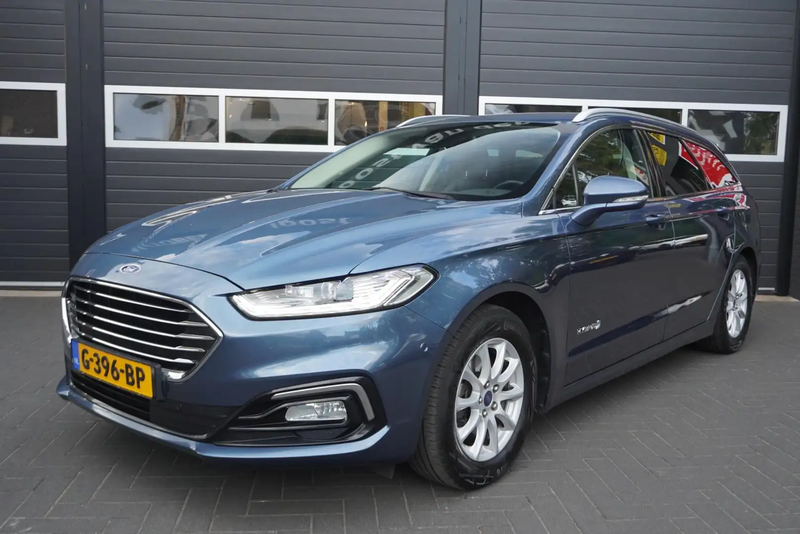 Ford Mondeo Wagon 2.0 IVCT HEV Titanium Aut/Cruise/Camera/Navi Blauw - 1