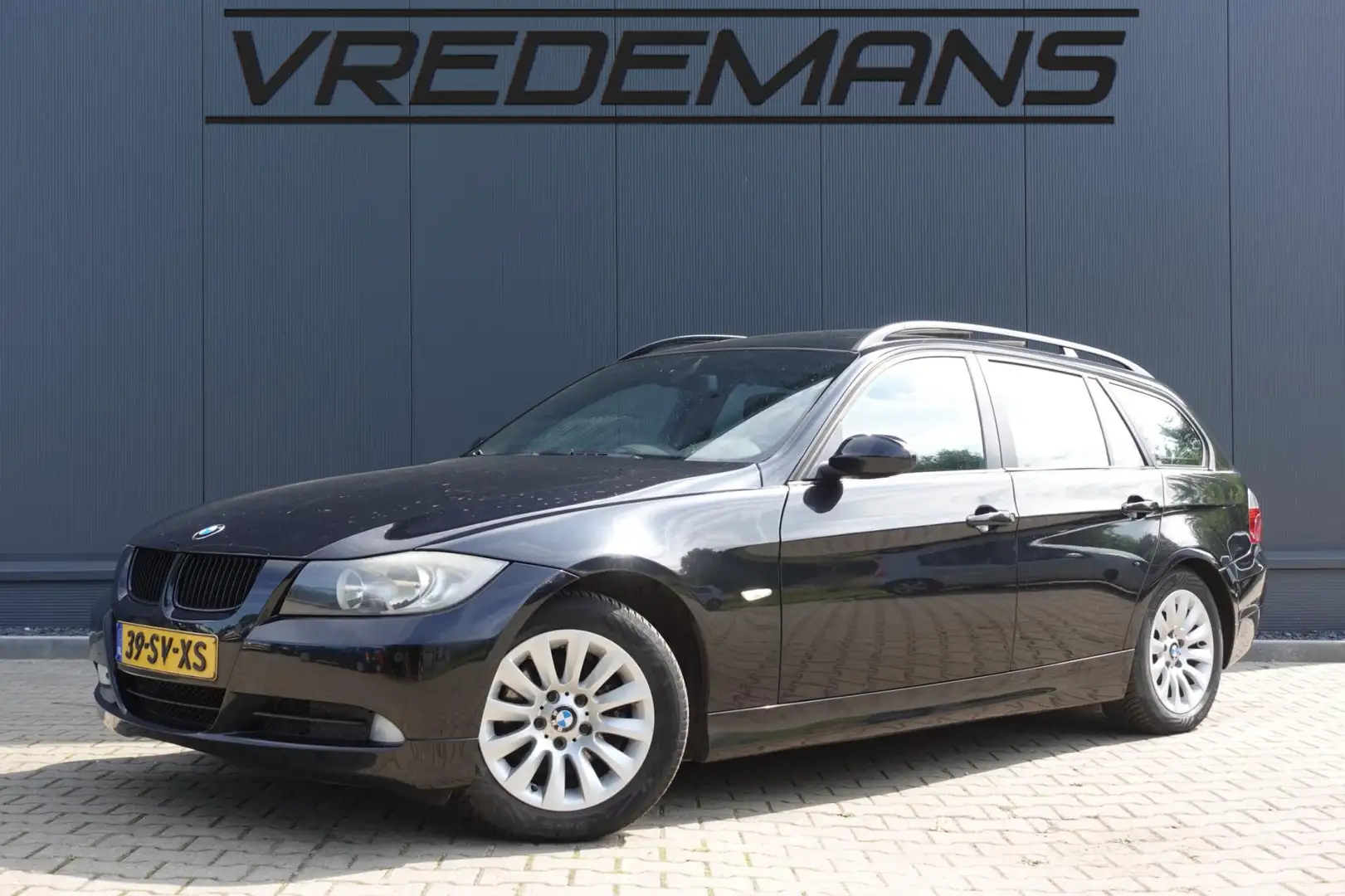 BMW 320 3-serie Touring 320i High Executive Zwart - 1