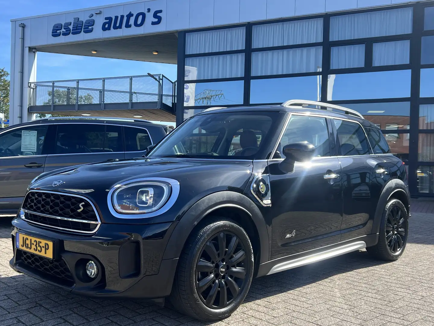 MINI Cooper SE Countryman Mini 2.0 ALL4 Navigatie Panoramdak Sportstoelen Le Zwart - 1