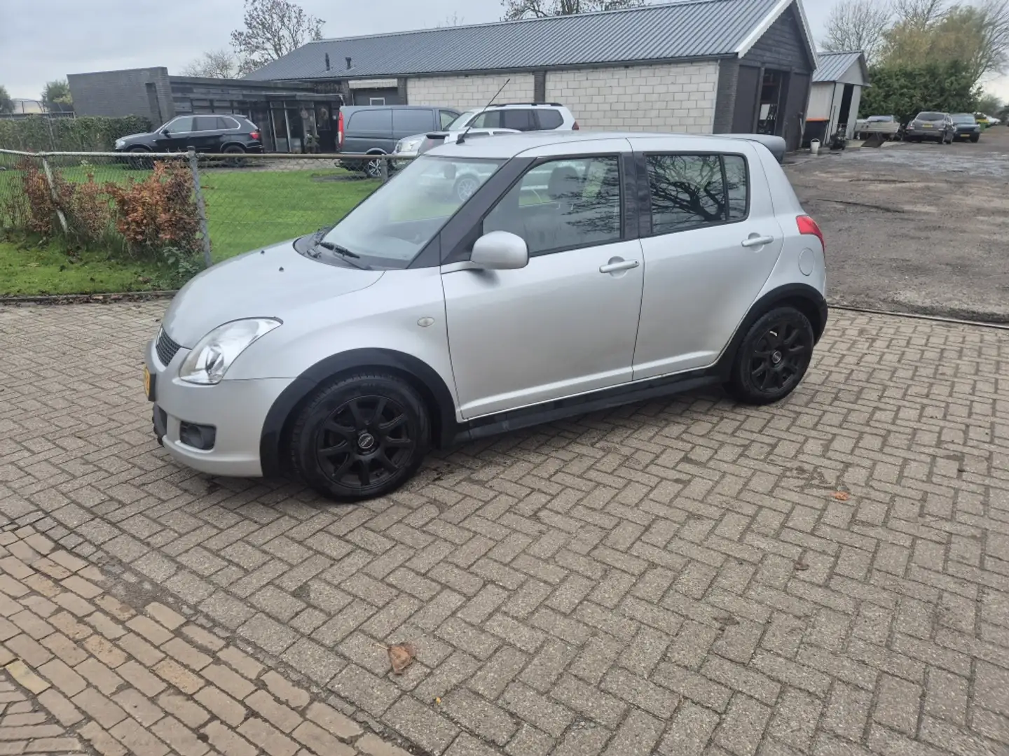 Suzuki Swift 1.3 D Exclusive inruilkoopje Gris - 1