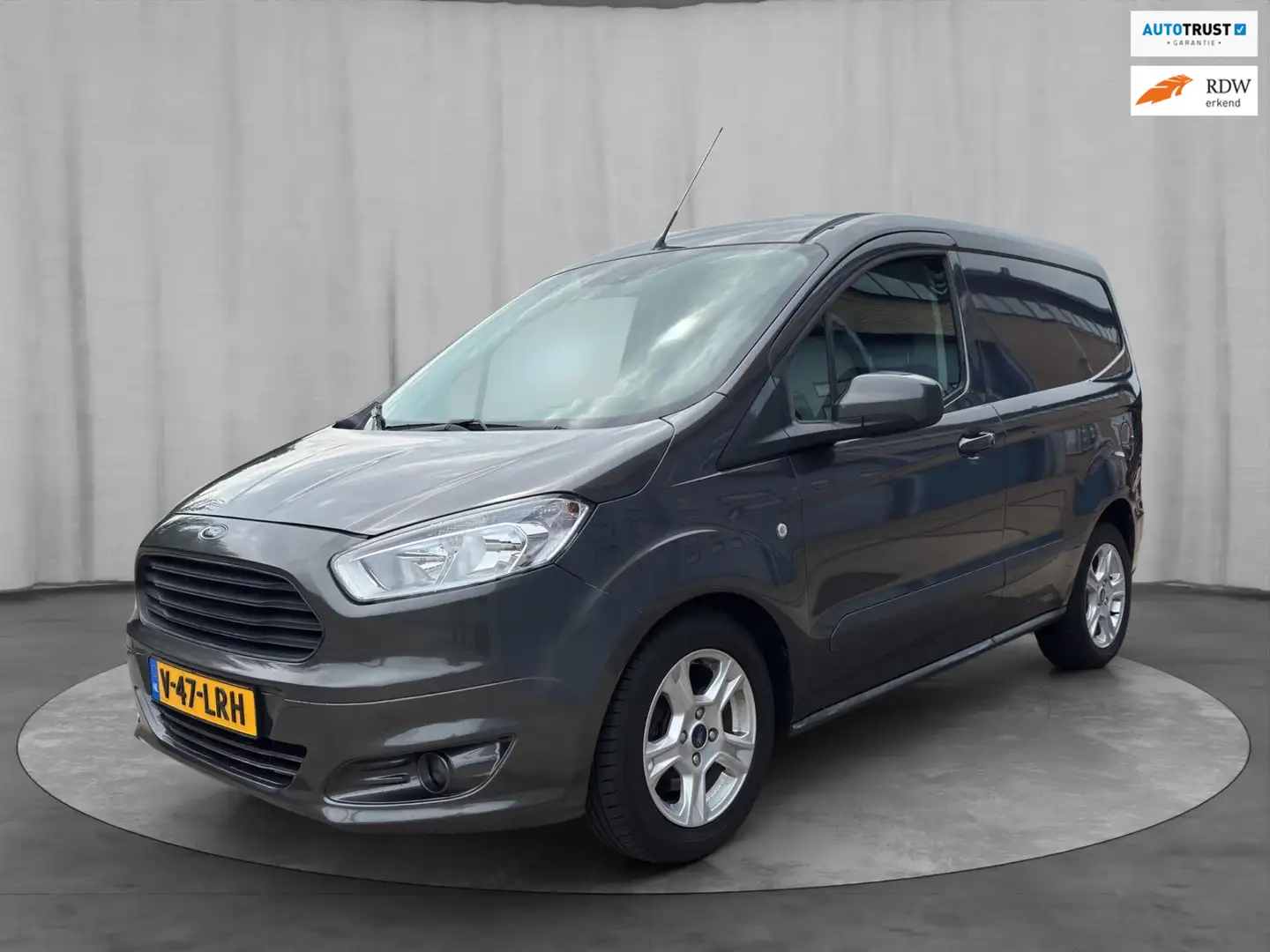 Ford Transit Courier 1.0 Trend. 2018. Benzine. GRIJS KENTEKEN. AIRCO. Grigio - 1