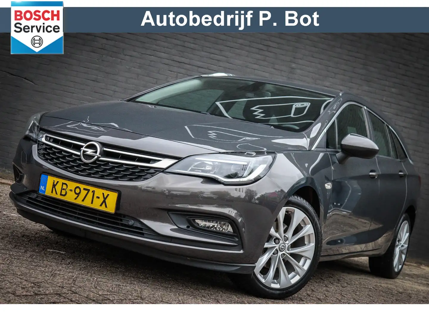 Opel Astra Sports Tourer 1.0 Edition Airco/Navi/Camera/Cruise Gris - 1
