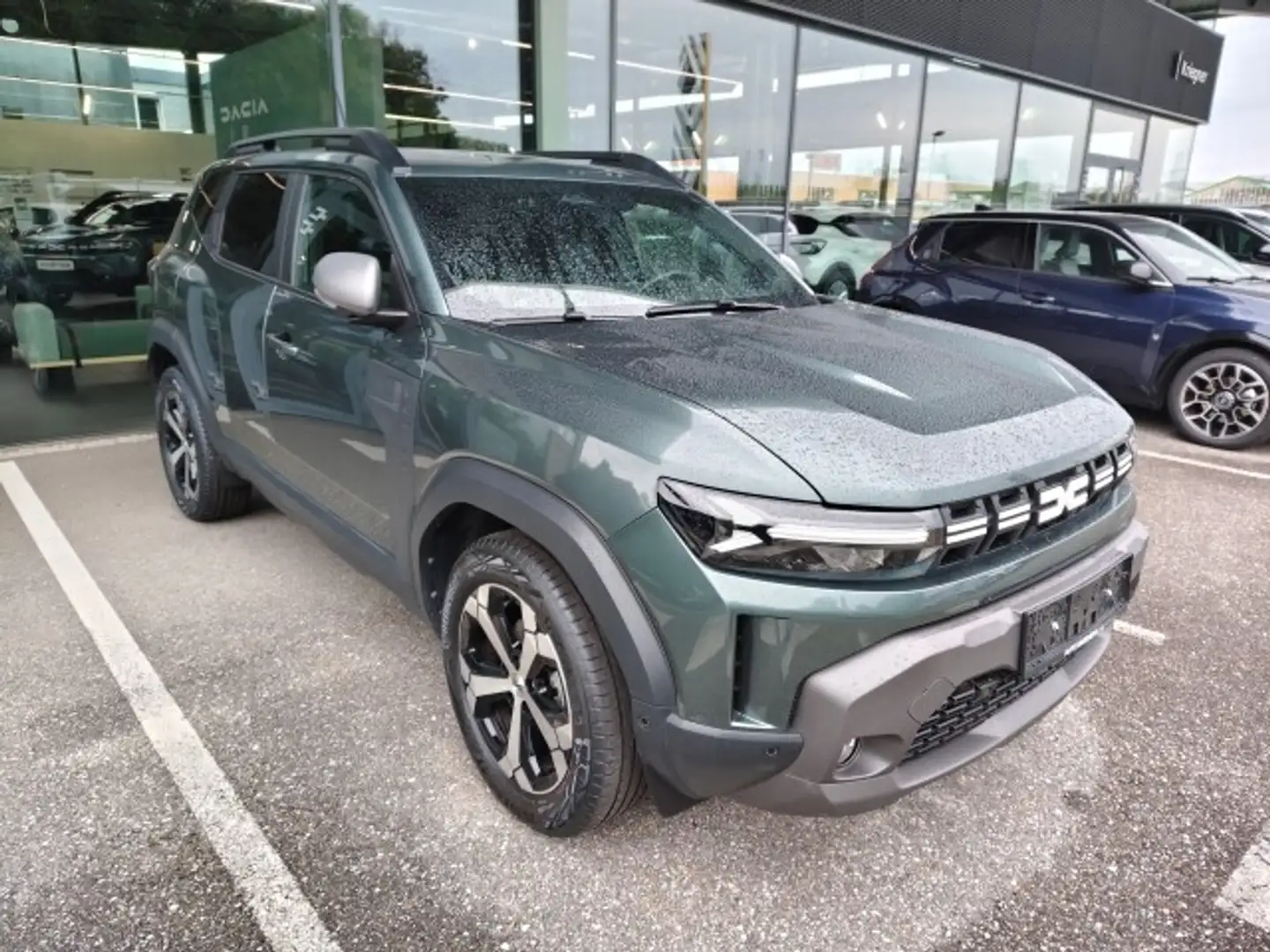 Dacia Duster Journey Hybrid 140 Grün - 1