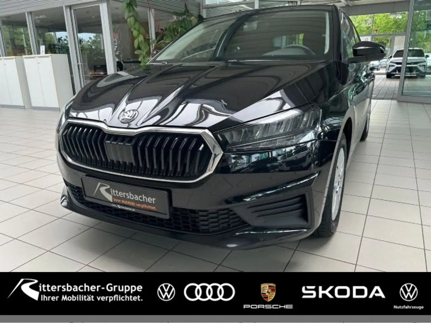 Skoda Fabia 1.0 TSI Ambition PDC Klima Smartlink Schwarz - 1