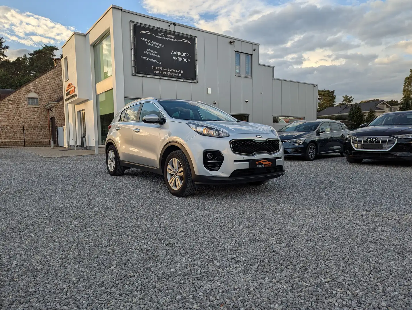 Kia Sportage 1.6 GDI 2WD | NAVI | CAMERA | LEER | TREKHAAK Zilver - 1