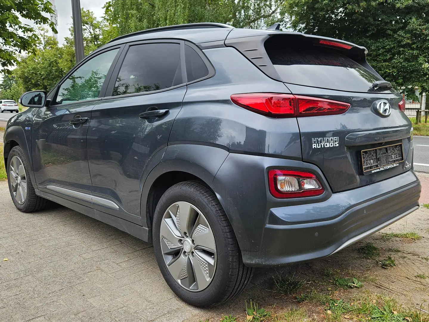 Hyundai KONA Kona EV Premium*LEATHER*HEAD UP*BLISS*NET 14500e Grijs - 2
