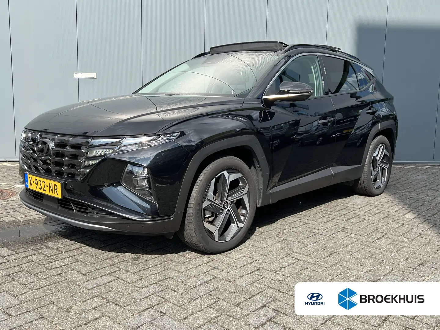 Hyundai TUCSON 1.6 T-GDI 265pk PHEV Premium Sky 4WD | Leder | Sch Schwarz - 1