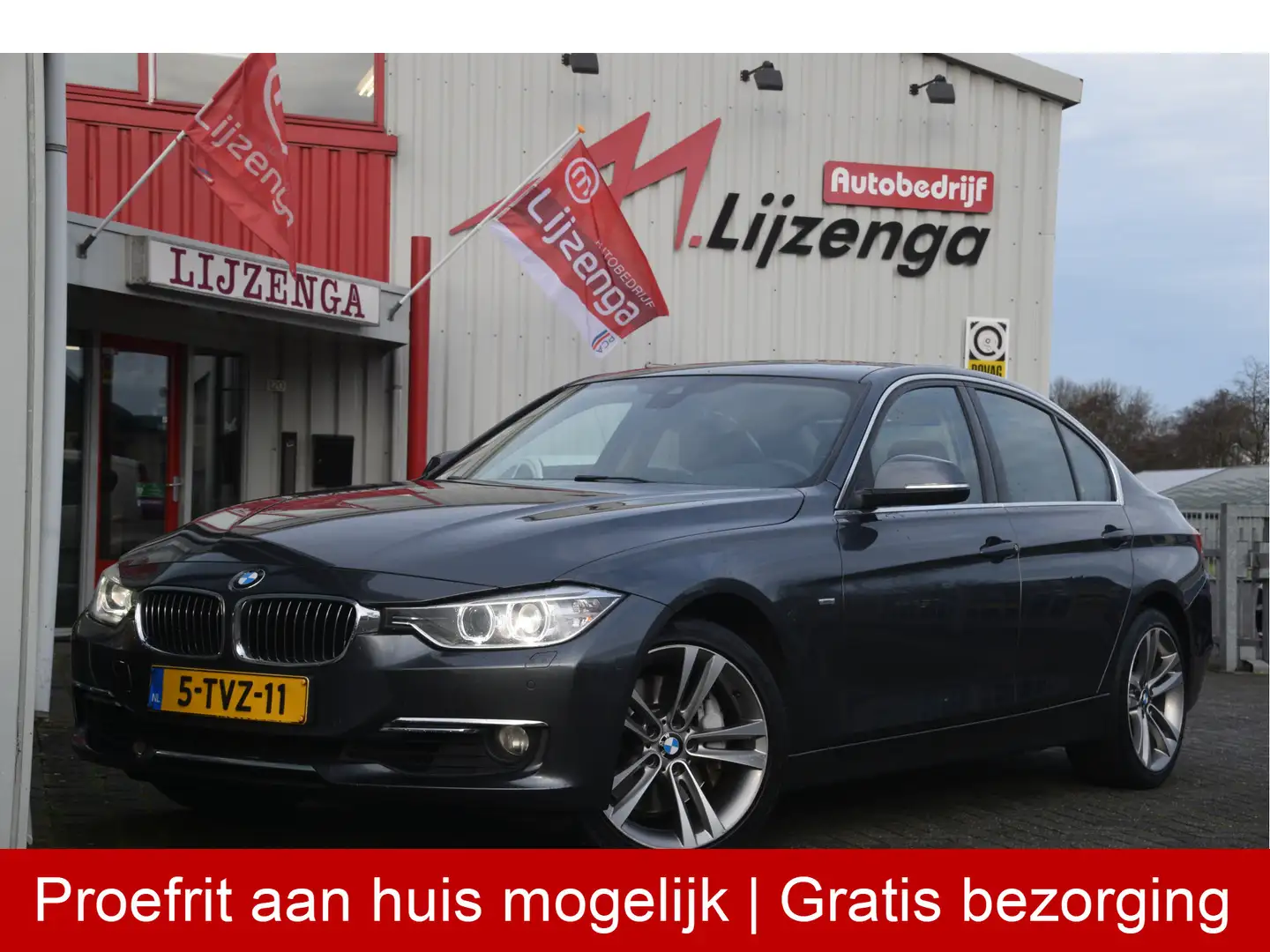 BMW 335 3-serie 335i xDrive High Executive Leer | Pano | N Grau - 1