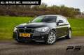 BMW 116 1-serie 116i Business+ M-Sport, NAP, 1e eigenaar, Zwart - thumbnail 1