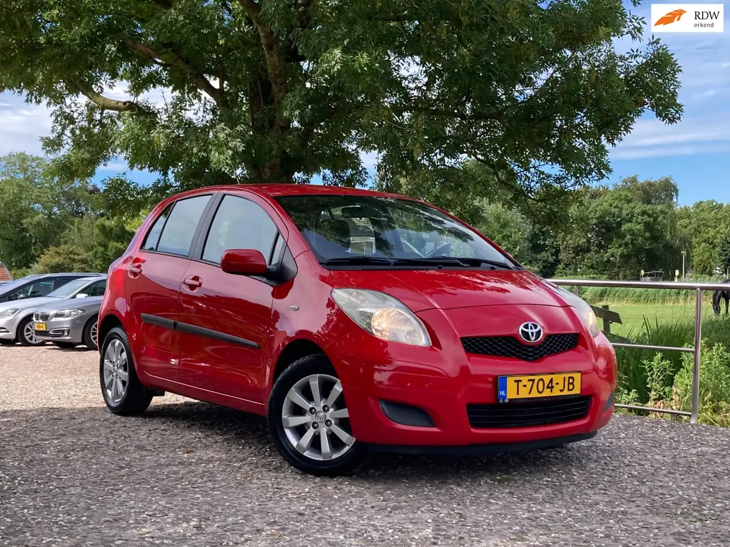 Toyota Yaris 1.3 VVTi Aspiration | Automaat + Airco nu € 5.975, Rouge - 1