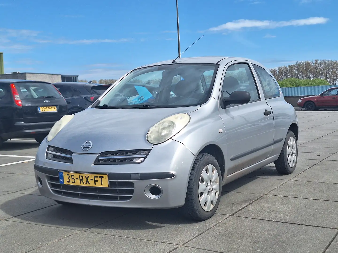 Nissan Micra €1350,- 1.2 Visia Airco + Apk+ Onderhoud Nappas Gris - 1