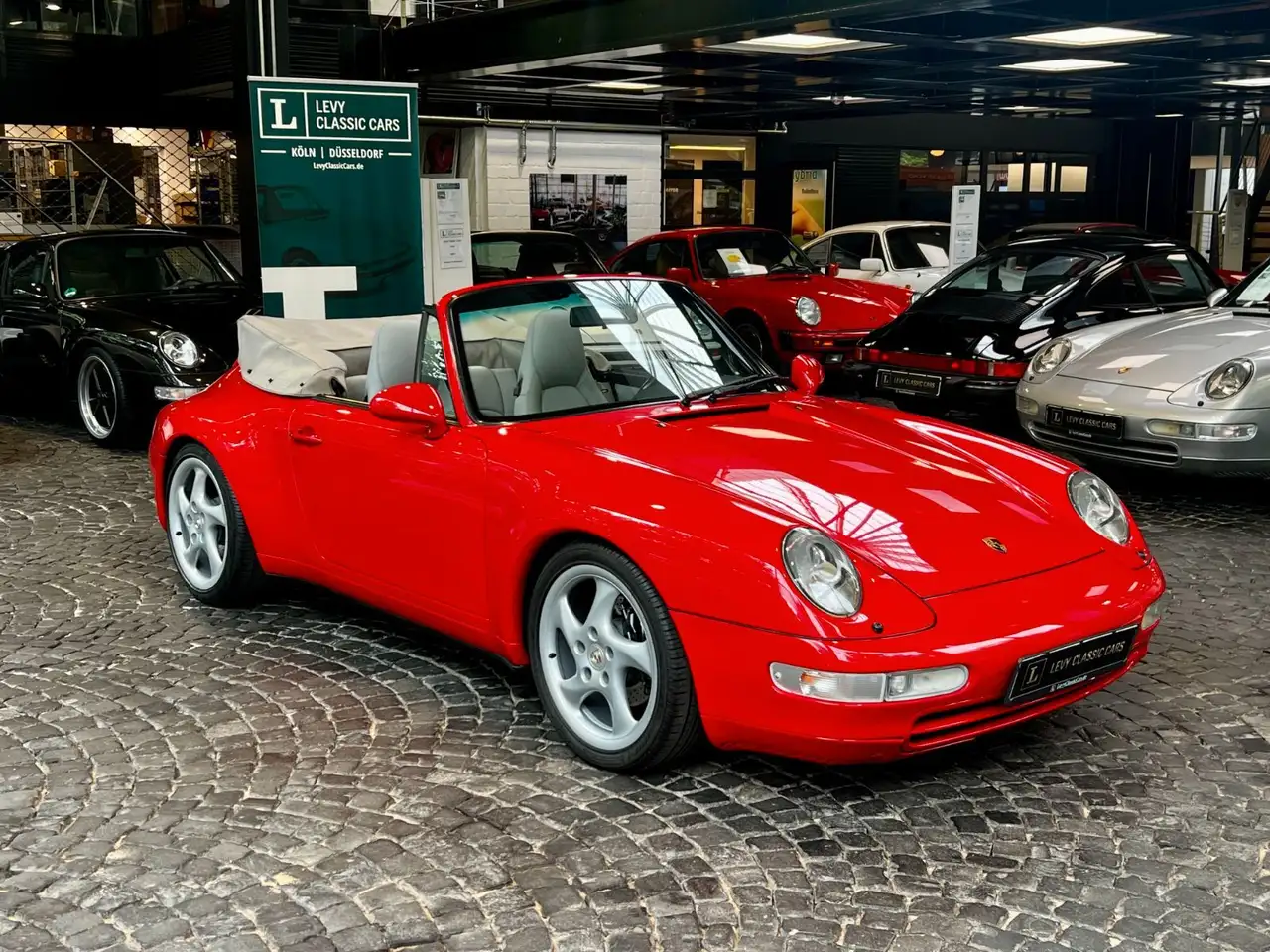 Porsche 993 911 Carrera 2 Cabrio Scheckheft, foto 1