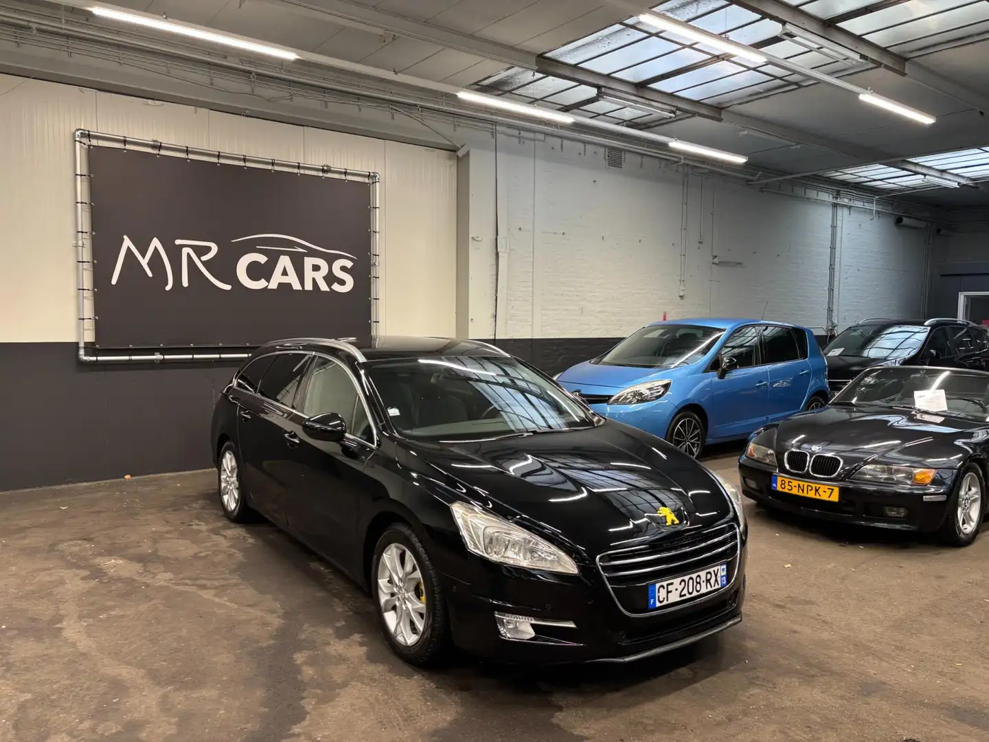 Peugeot 308 SW 1.6 e-HDi Blue Lease Executive pano/clima/leder Schwarz - 2