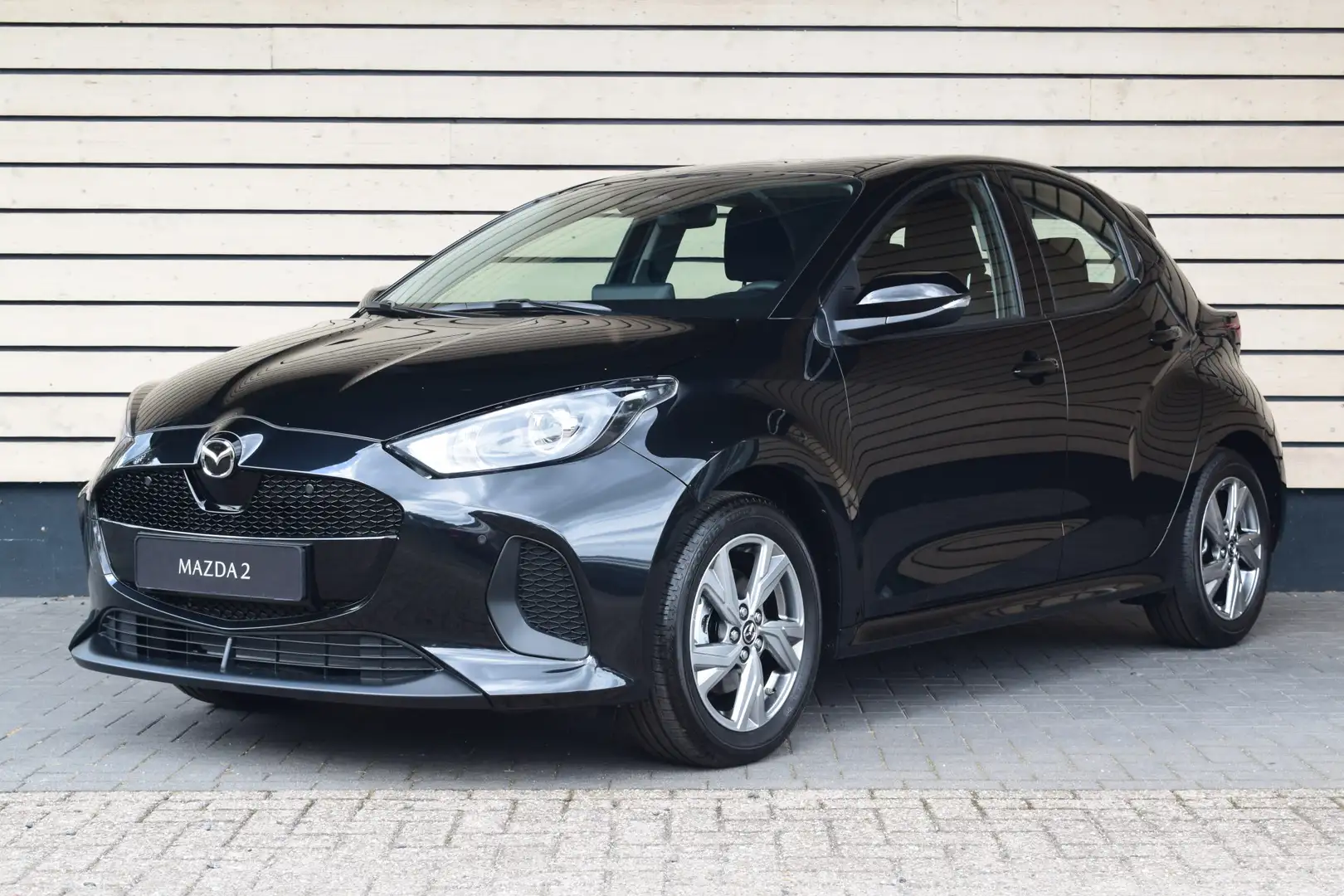 Mazda 2 Hybrid 1.5 Exclusive-line - € 3.000,- voorraadkort Zwart - 2