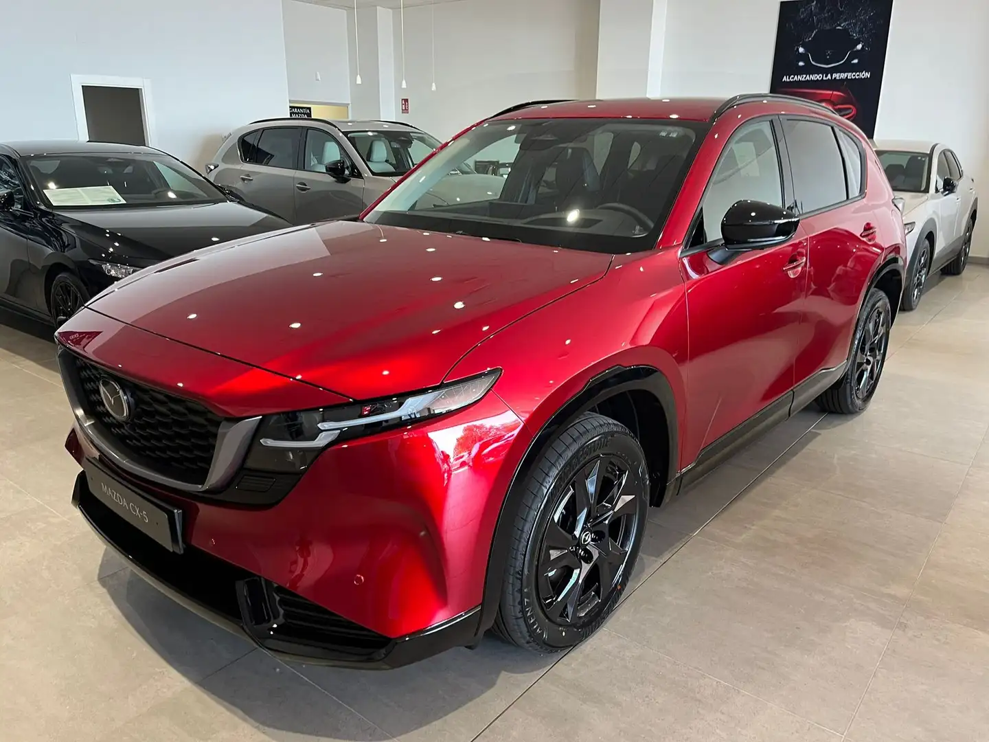 Mazda CX-5 2.5 e-Skyactiv-G MHEV Homura FWD Aut. Rojo - 1