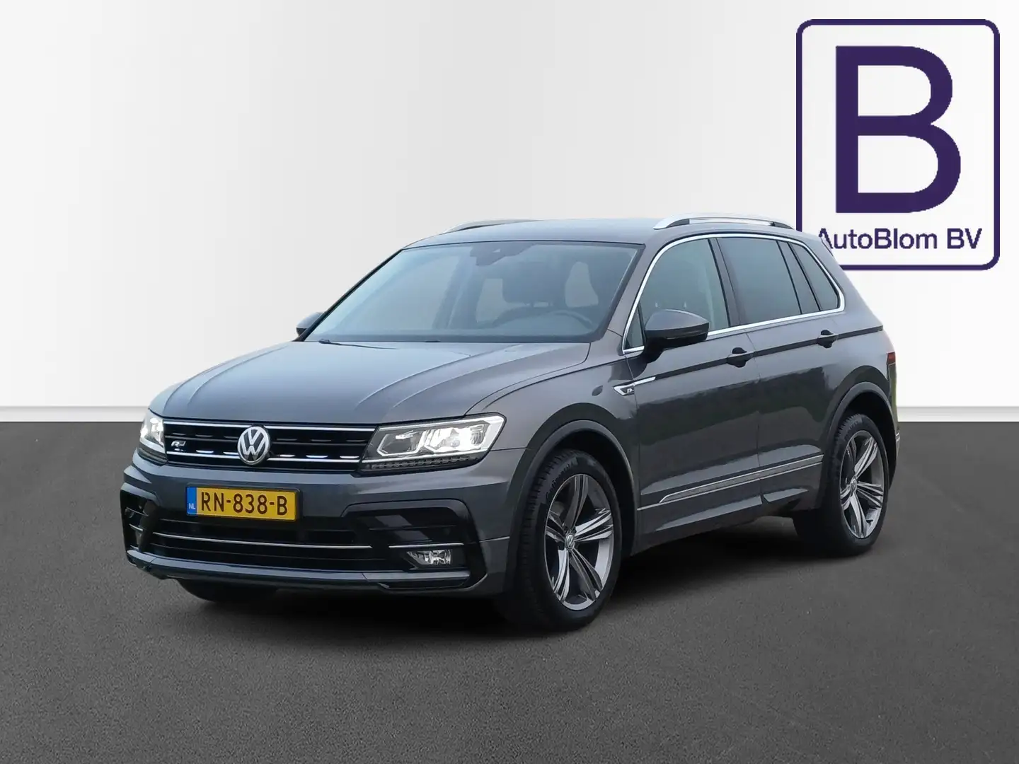 Volkswagen Tiguan 1.4 TSI ACT R-Line /Prachtige auto!/ Grau - 1