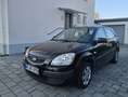 Kia Rio 1.4 EX Bj. 2009 Schwarz - thumbnail 1
