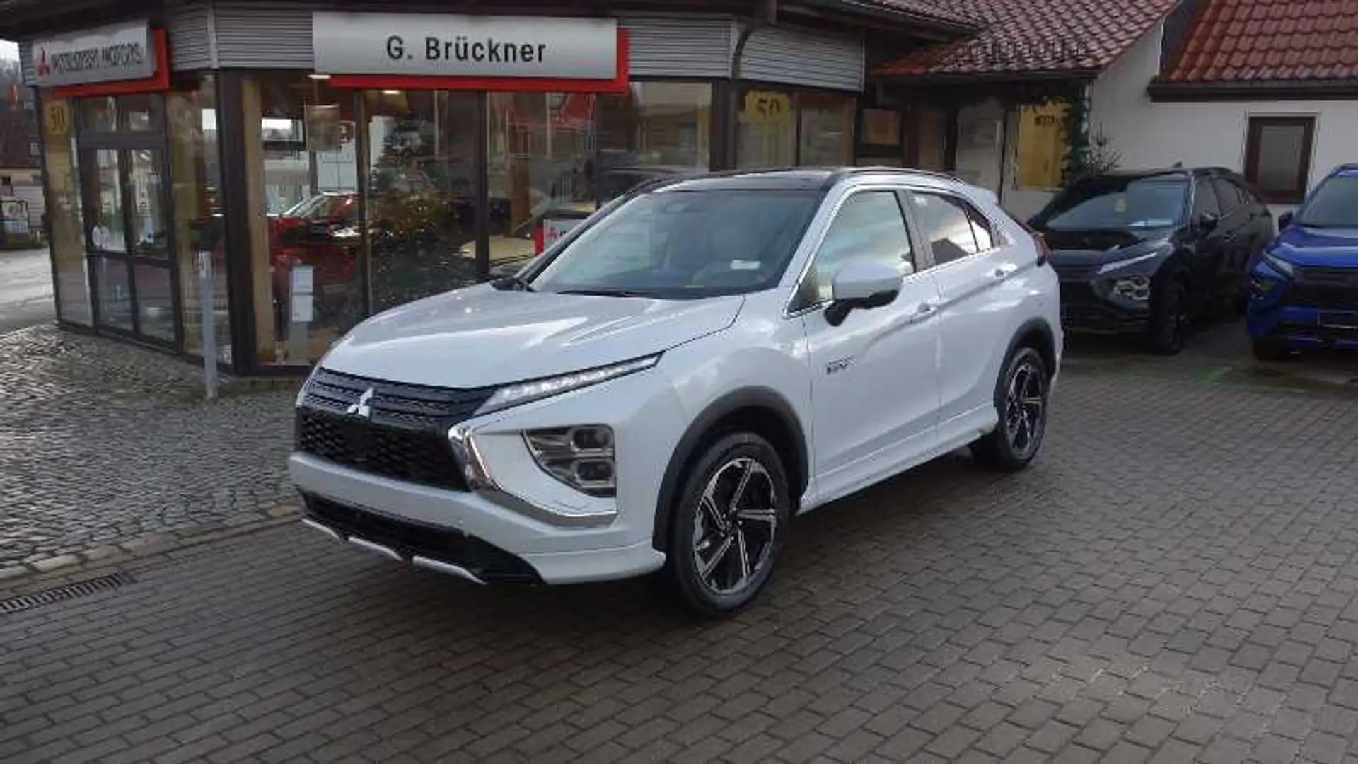 Mitsubishi Eclipse Cross PHEV TOP 2.4 4WD,Schiebedach,Winterräder Blanc - 1